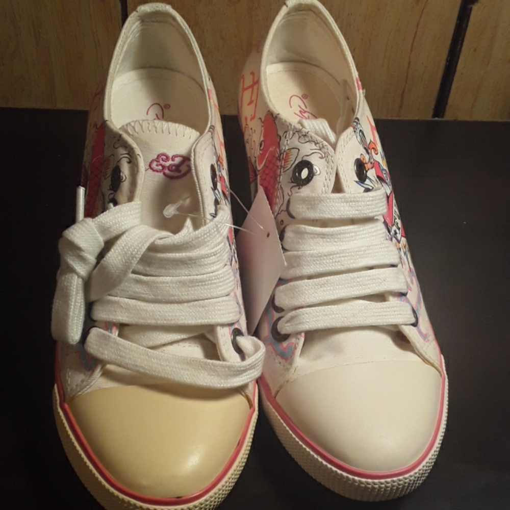 New size 5 Ed Hardy wedges.
